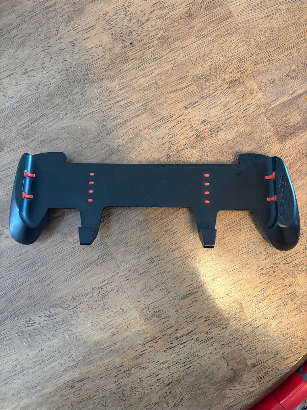 Black Mobile Game Controller Grip with Red Accents